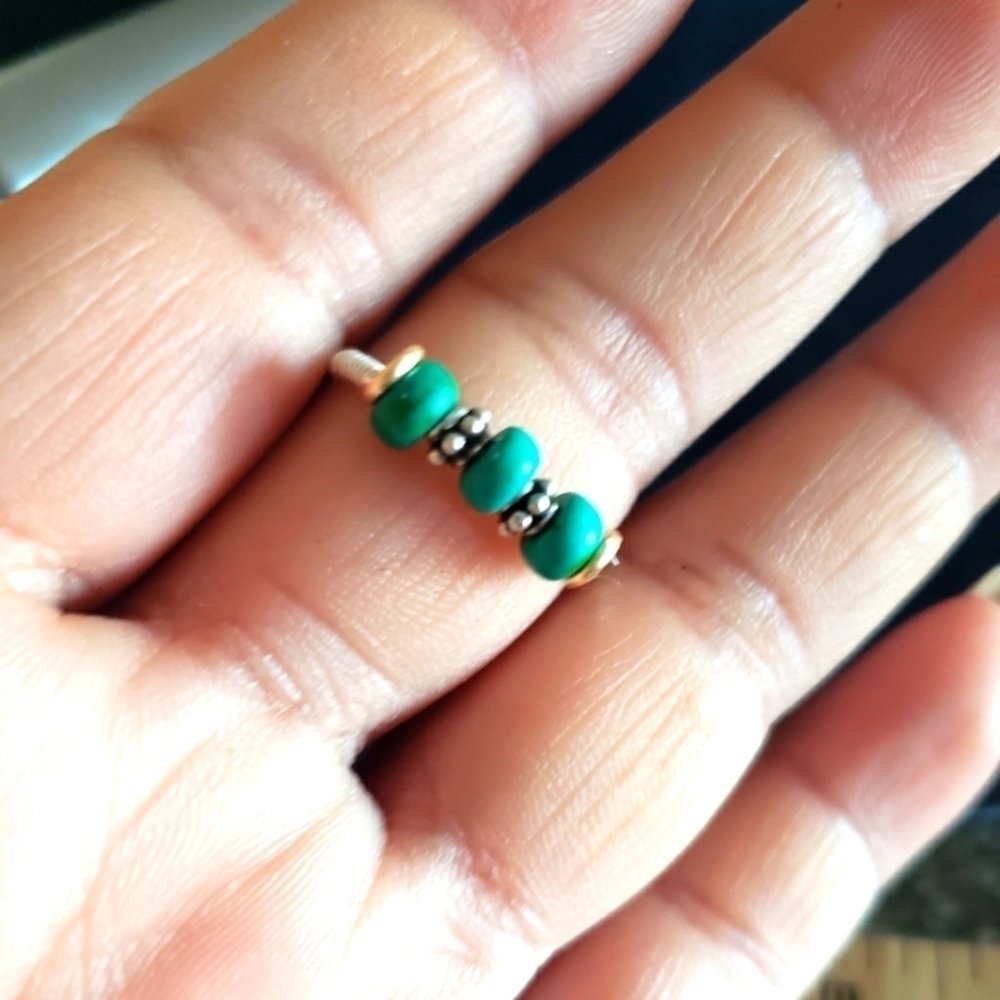 Handmade silver and gold wire wrapped ring with sterling silver spacer Turquoise